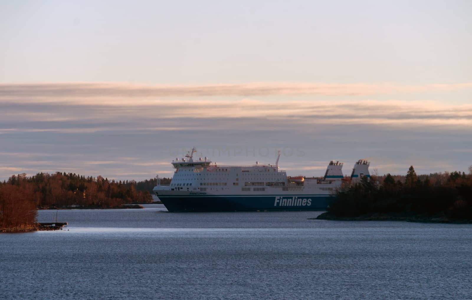 22 April 2019, Stockholm, Sweden. High-speed passenger and car ferry of the Finnish shipping concern FINNLINES Finnclipper equipped with rotary sail in Stockholm skerries.