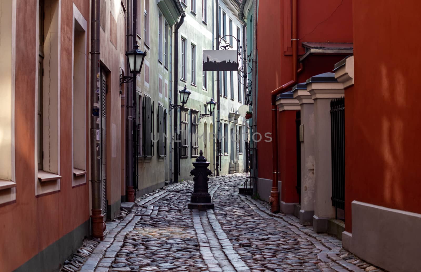 April 26, 2018 Riga, Latvia. Colorful houses on the narrow street of the Old Town in Riga.