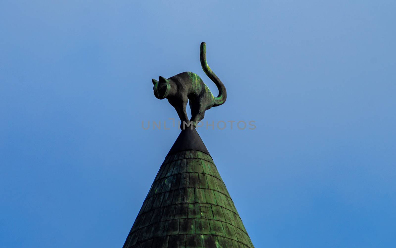 April 26, 2018 Riga, Lativia. Cat statue on the roof of an apartment building in Straom city in Riga.