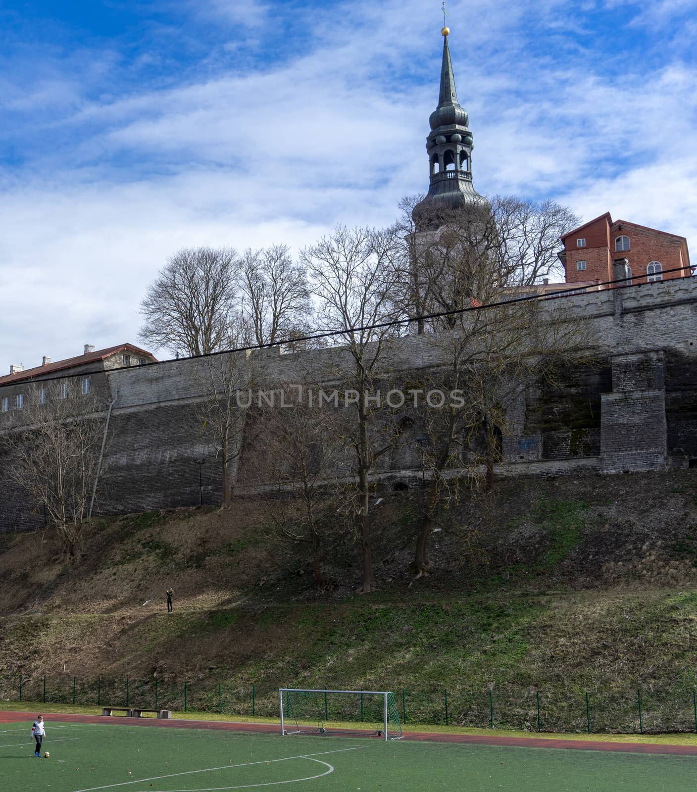 April 21, 2018 Tallinn, Estonia. Football field at the fortress wall of the Old city in Tallinn