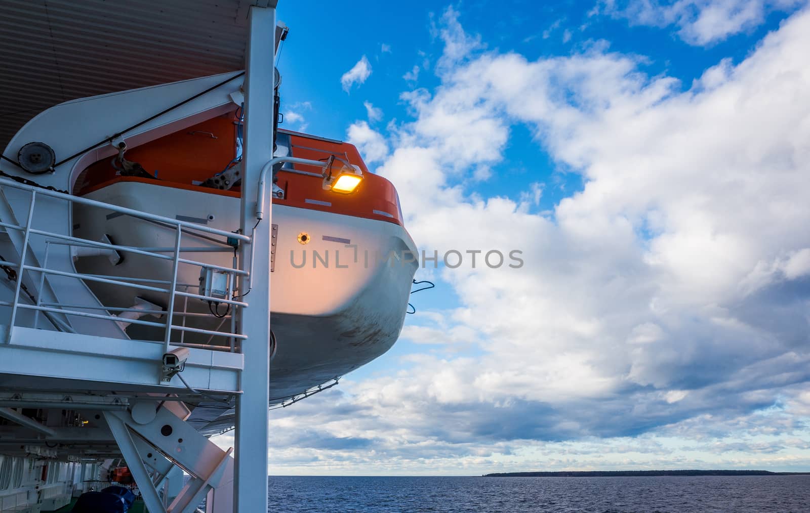Lifeboats aboard a modern cargo and passenger ferry.