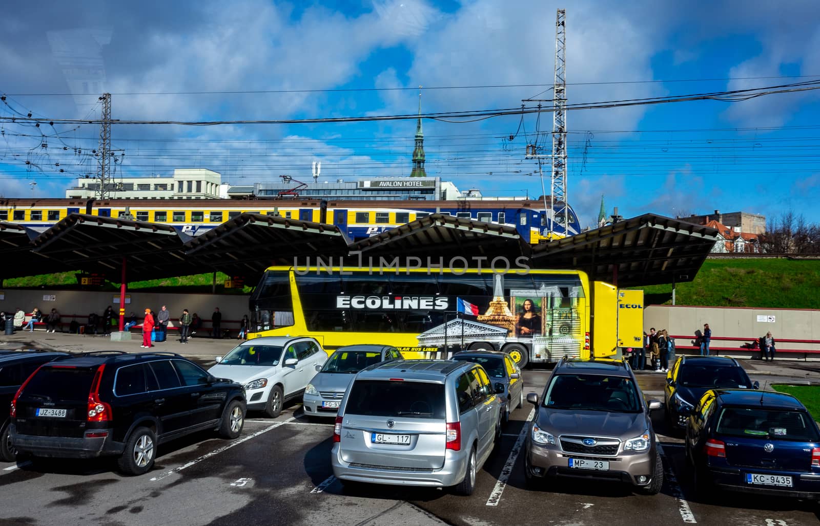April 26, 2018 Riga, Latvia. Yellow passenger bus of the Ecolines company at the bus station in Riga.