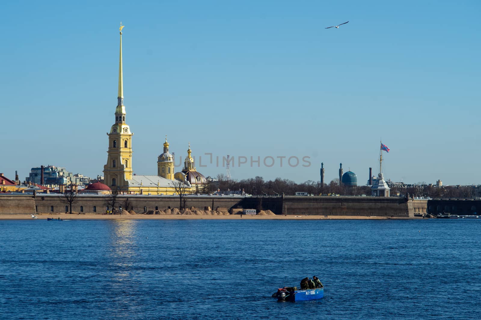 April 29, 2018 Saint Petersburg, Russia. Fishermen in motor boats catch smelt on the Neva river opposite the Peter and Paul fortress.