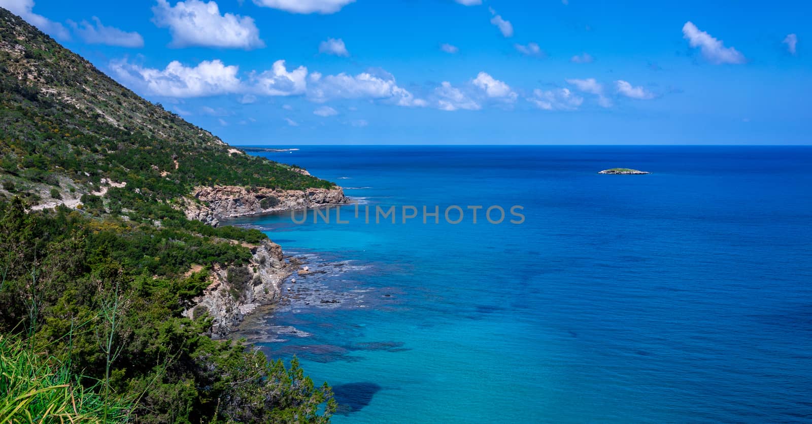 Green mountainous coast of the Mediterranean Sea on the Akamas Peninsula in the northwest of the island of Cyprus.