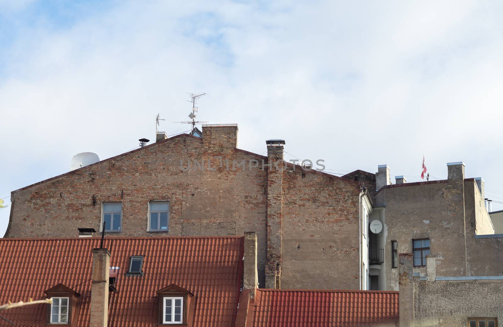April 26, 2018 Riga, Latvia. Roofs and firewall of a residential building in Strom city in Riga.