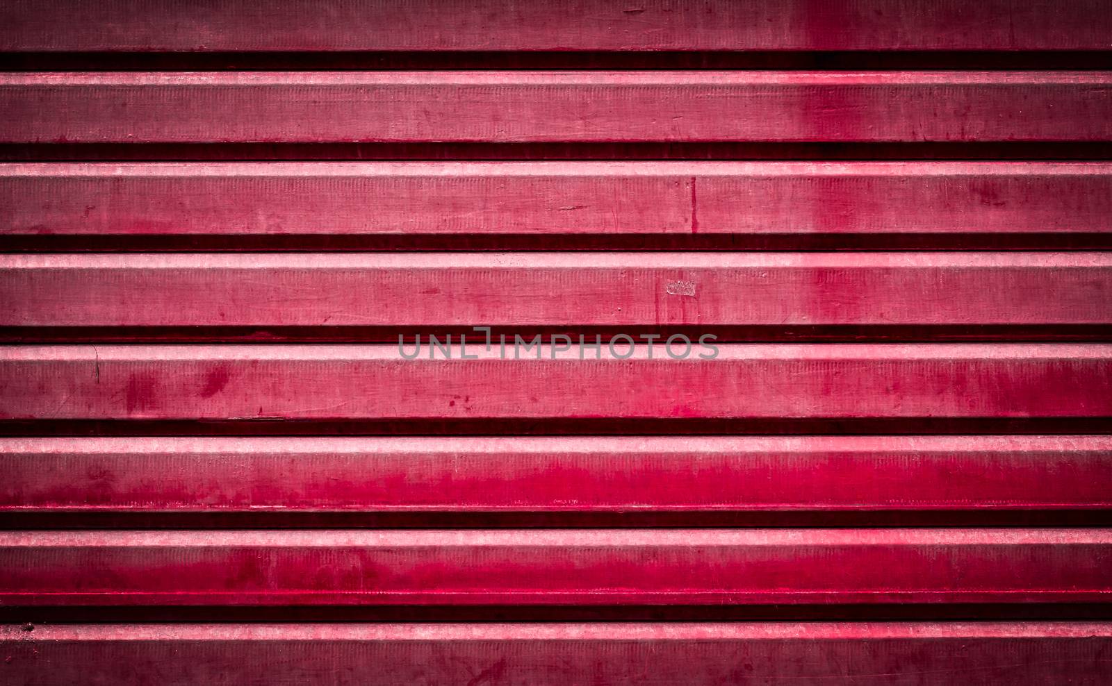 Background of red grunge metallic roller shutter door