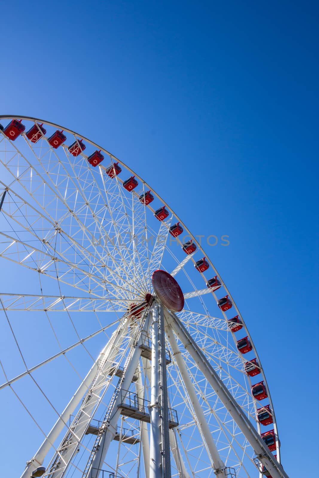 Jesolo, Italy, July 19 2016: ferris wheel on blue sky background.