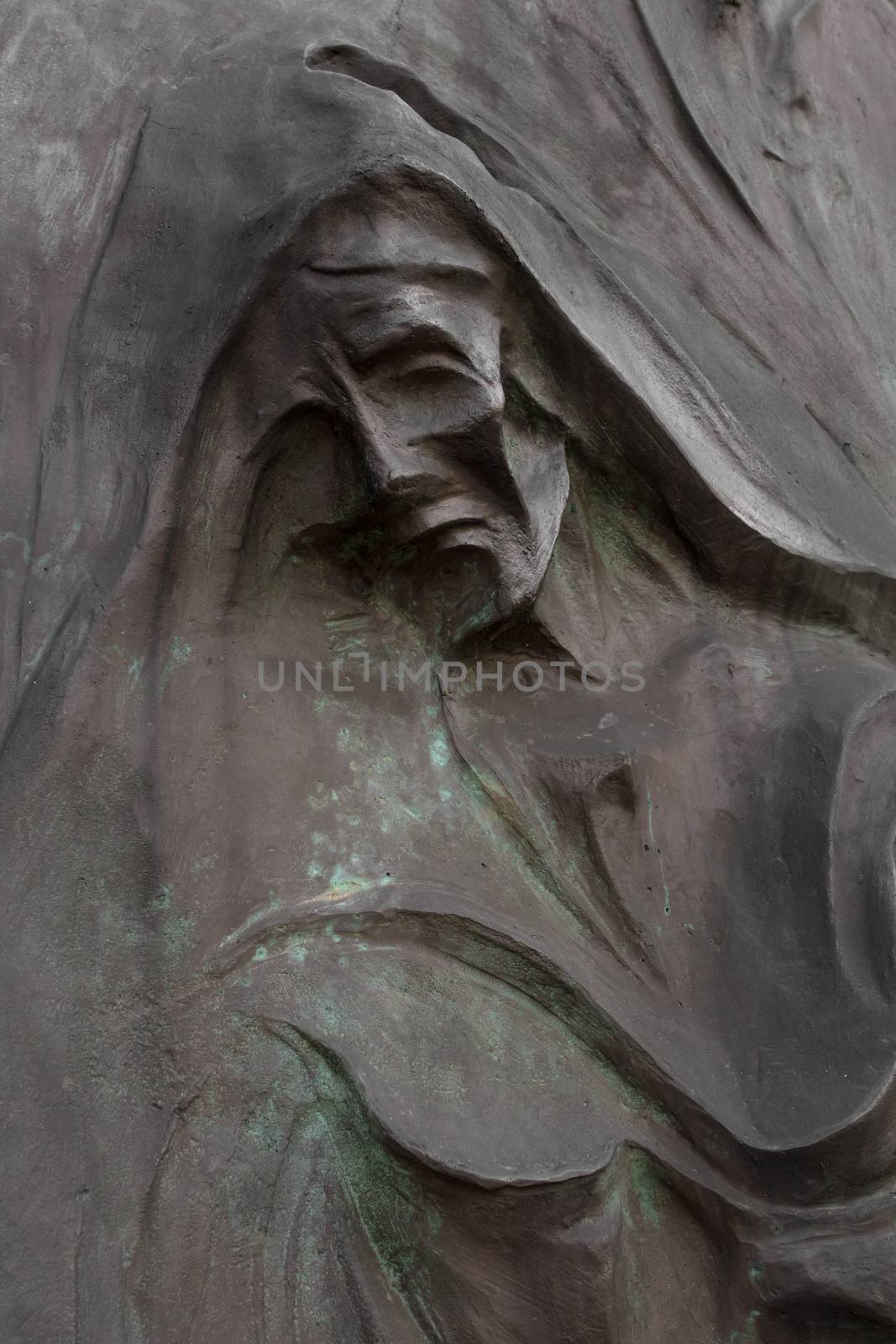 Sculpture depicting Death, in an Italian cemetery.