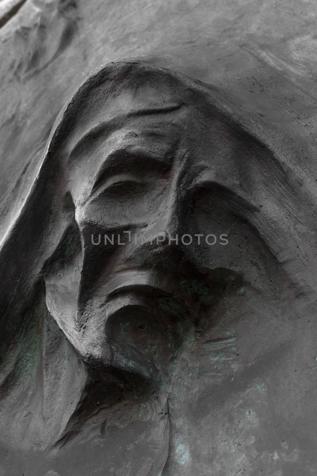 Sculpture depicting Death, in an Italian cemetery.