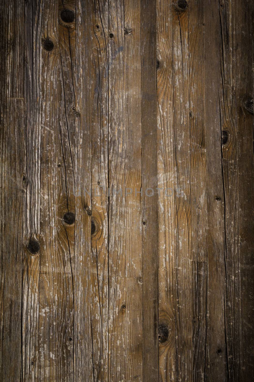 Rustic wooden background, scratched and damaged by time