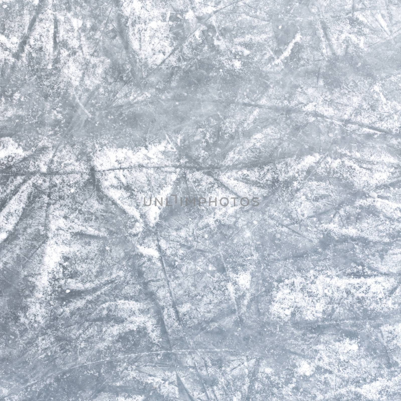 Ice rink floor, detail of a textured background ice, winter sports.