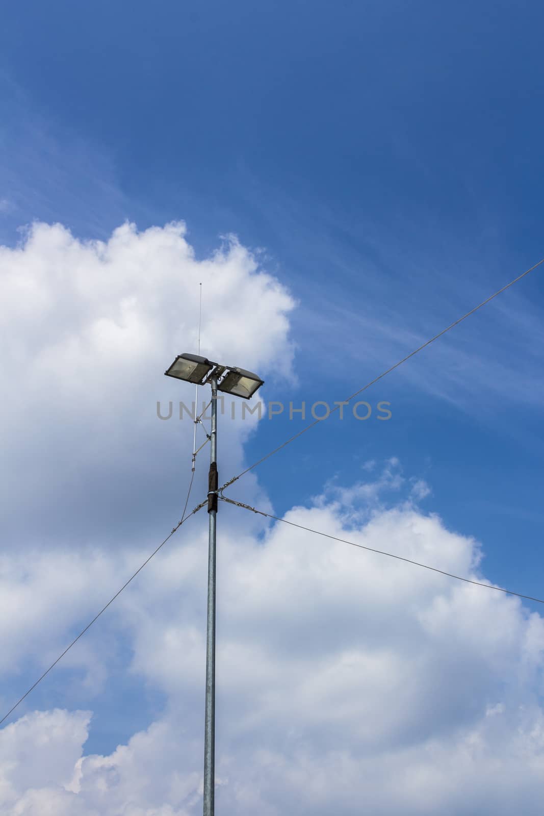 External illuminator with metal cables of connection and antenna .