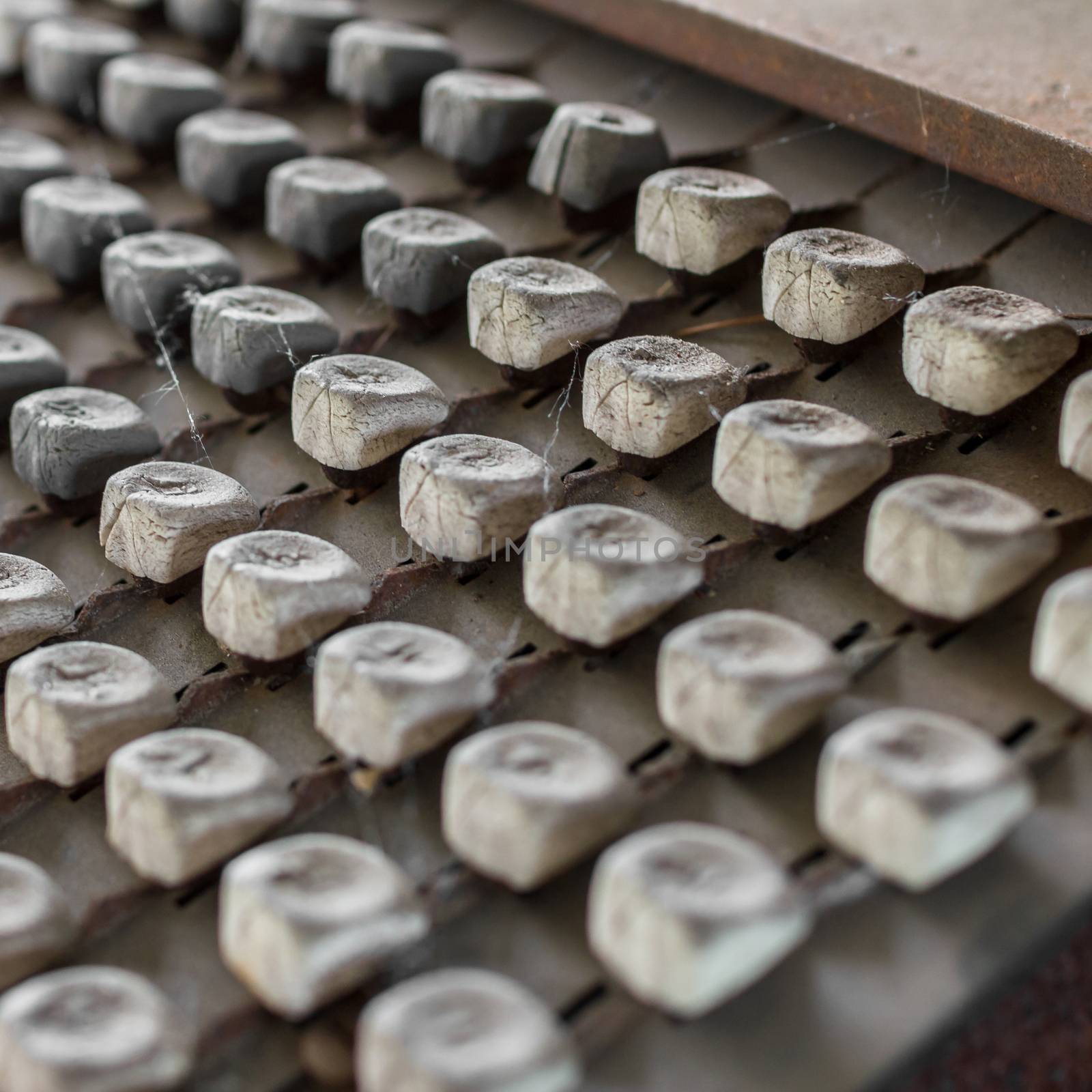 Details of an old keyboard on industrial machine of the late nineteenth century.