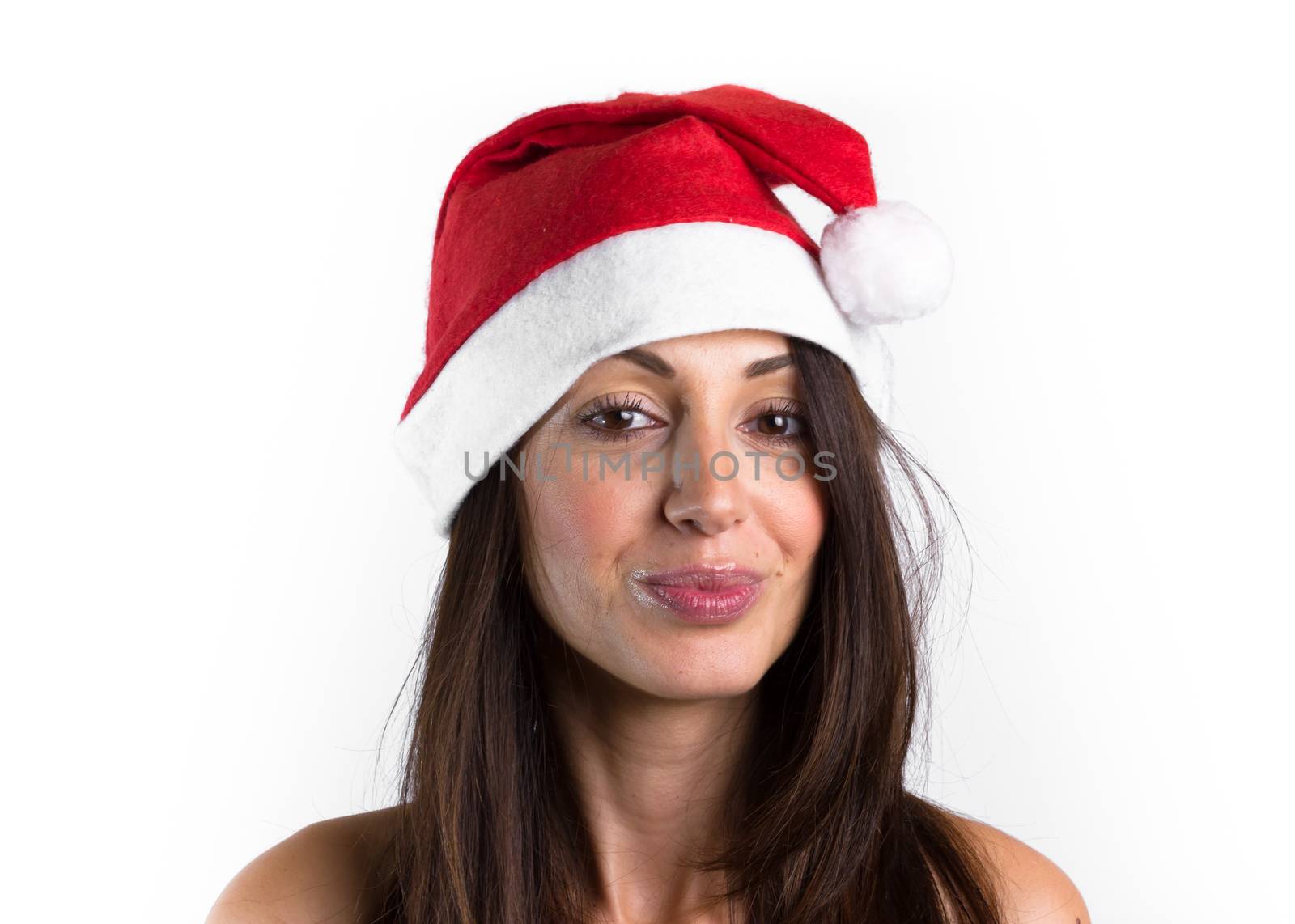 Beautiful female model, with brown hair, wear santa hat. Isolated over a white background.