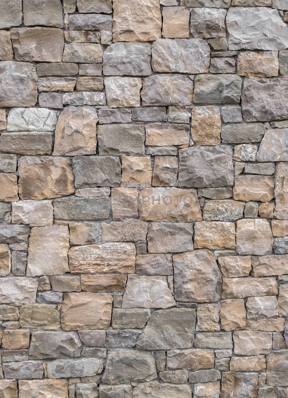 Decorative and irregular stone wall by germanopoli