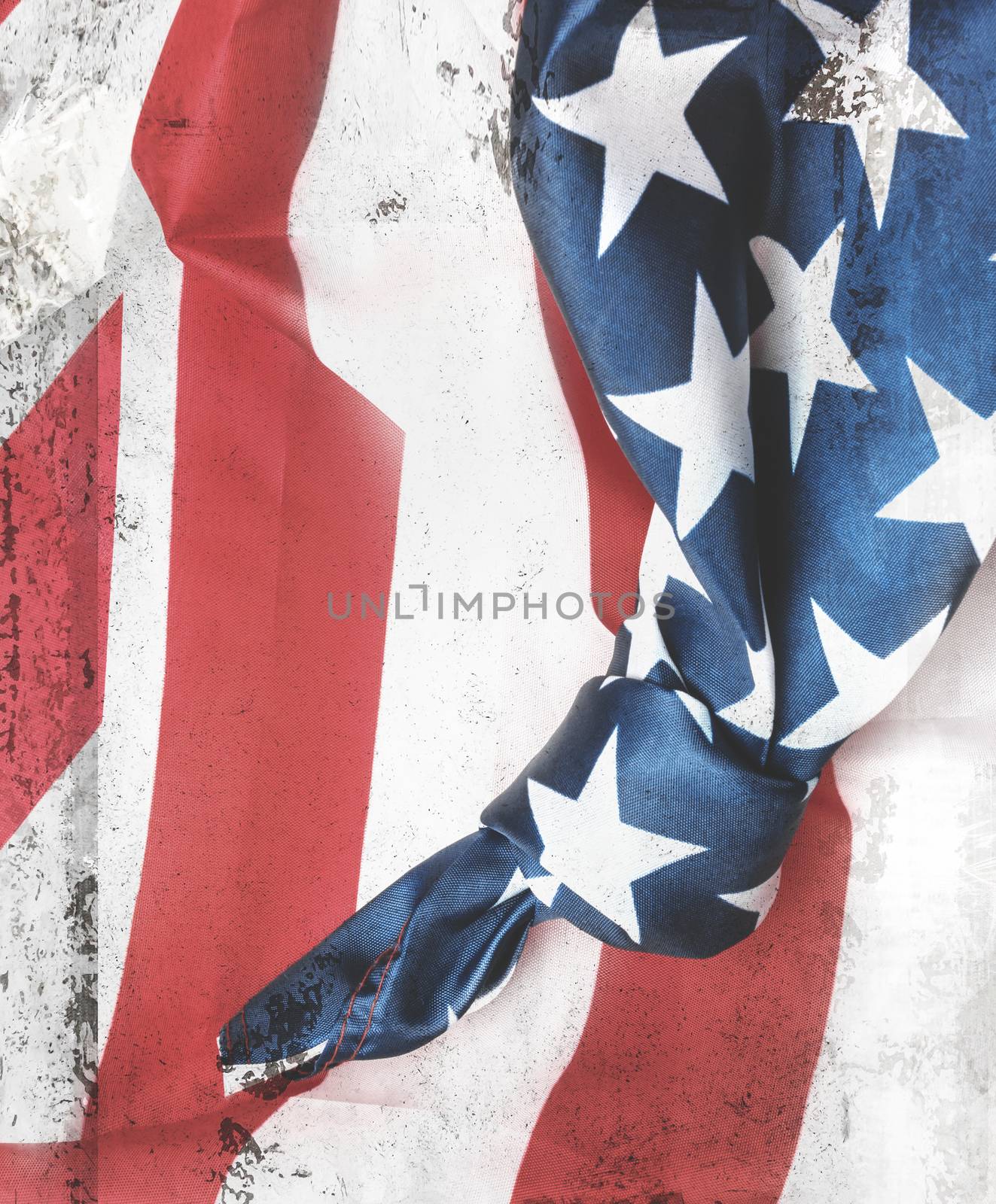 Closeup of American flag with knot. Conceptual representation of an important event to remember. Save the date. Grungy frame and remains of scotch tape and cellophane. It can be used as a food menu, poster, wallpaper, design t-shirts and more.