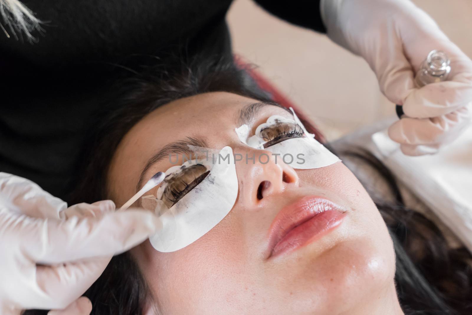 Cosmetic procedure of dyeing and lamination of eyelashes. Extension, perm, lamination of eyelashes. Eyelash care.