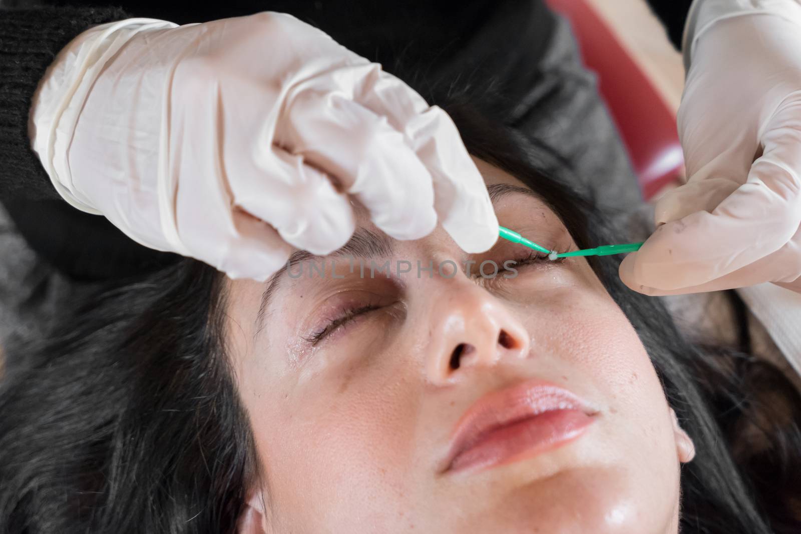 Cosmetic procedure of dyeing and lamination of eyelashes. Extension, perm, lamination of eyelashes. Eyelash care.