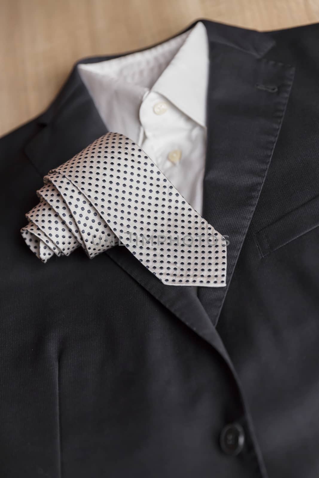 Jacket and tie detail by germanopoli