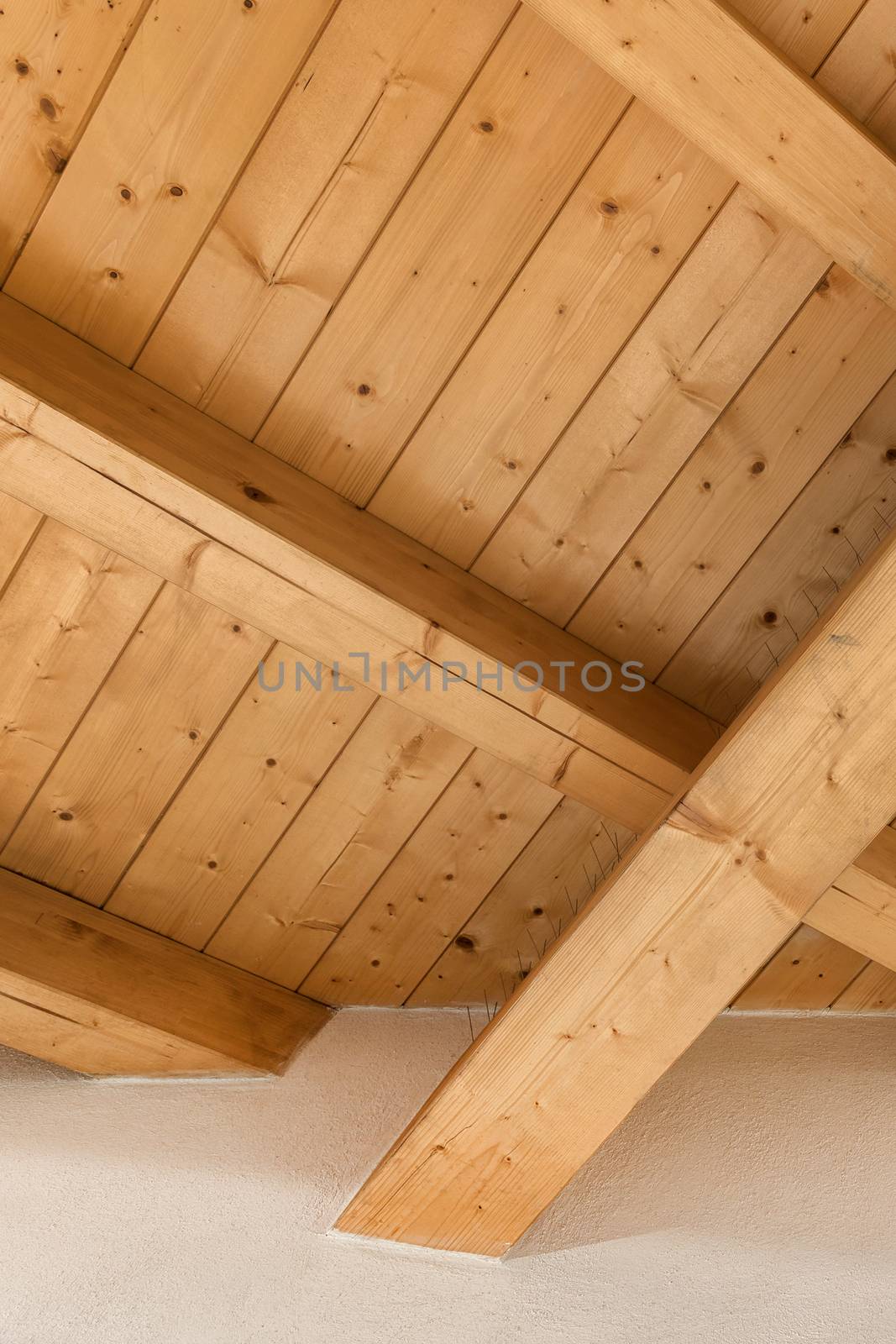 Interior wooden roof with exposed beams