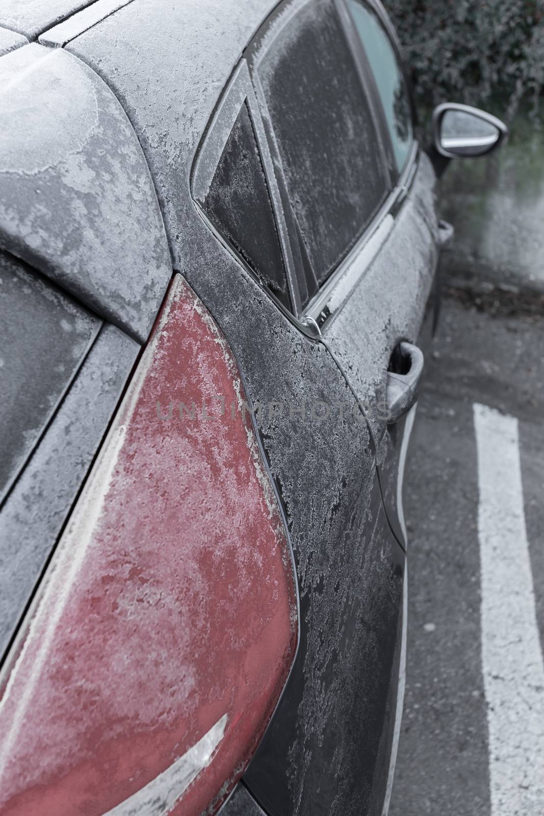 Frozen in the ice black car. Hoarfrost. Icy Accumulation. Ideal for concepts.