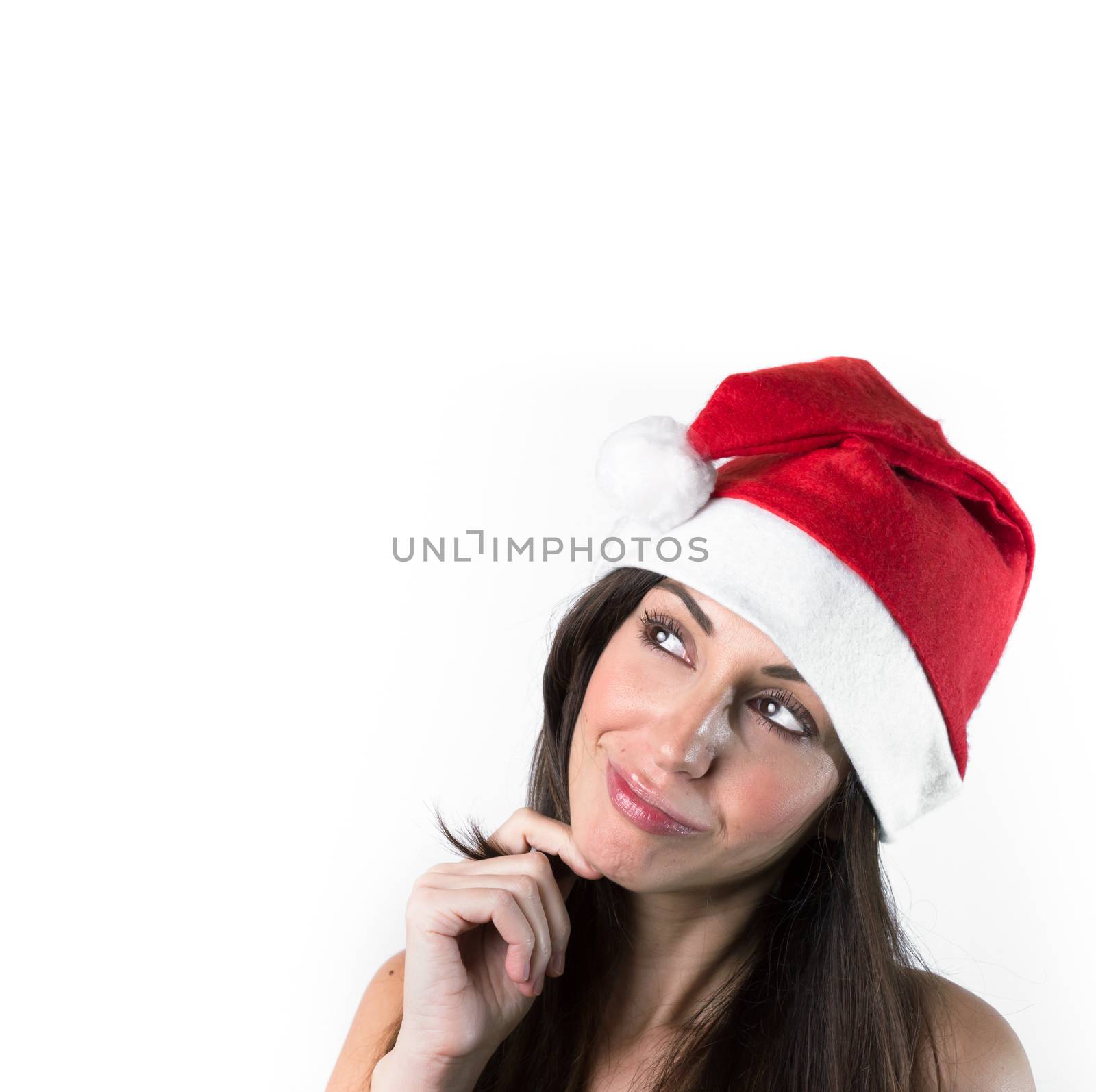 Portrait of beautiful woman with Christmas Santa Claus hat on white background. Christmas and Happy New Year message as greetings e-card or banner.