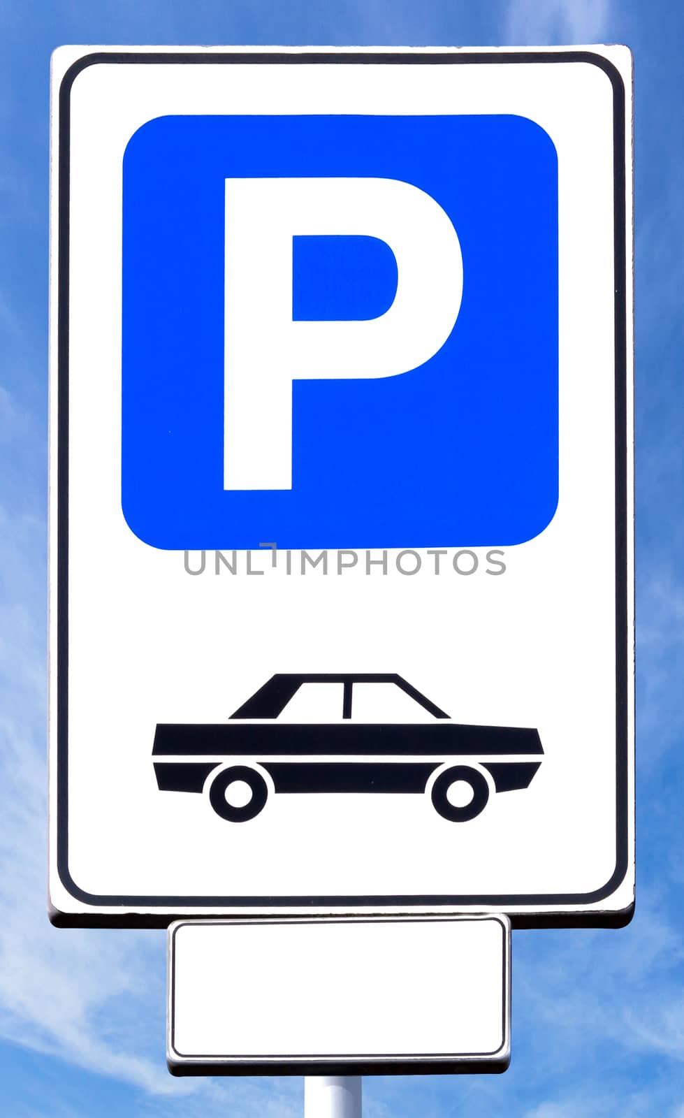 Parking sign with blue sky background on sunny day