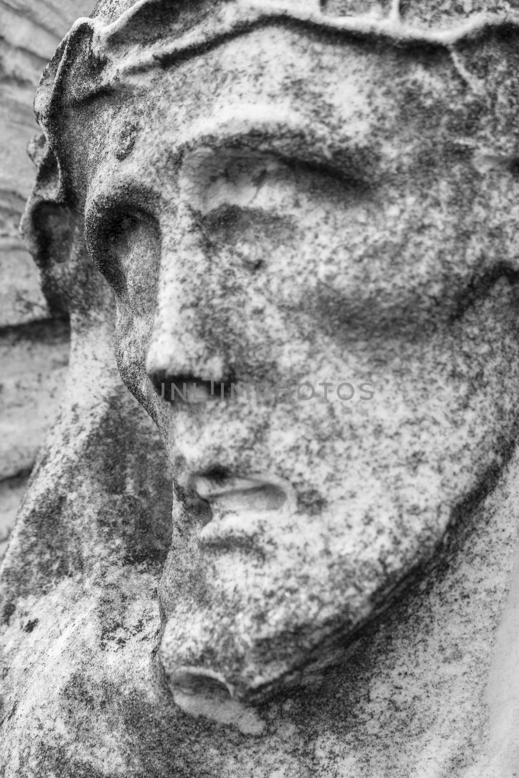 Fragment of Jesus Christ statue as a symbol of love, faith and religion.