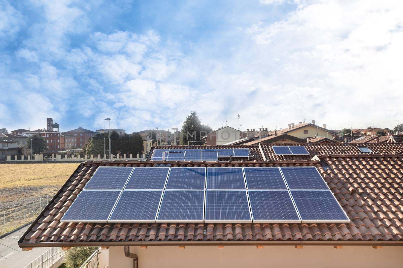 Solar panel on a red roof. Renewable energy source. Present technology.