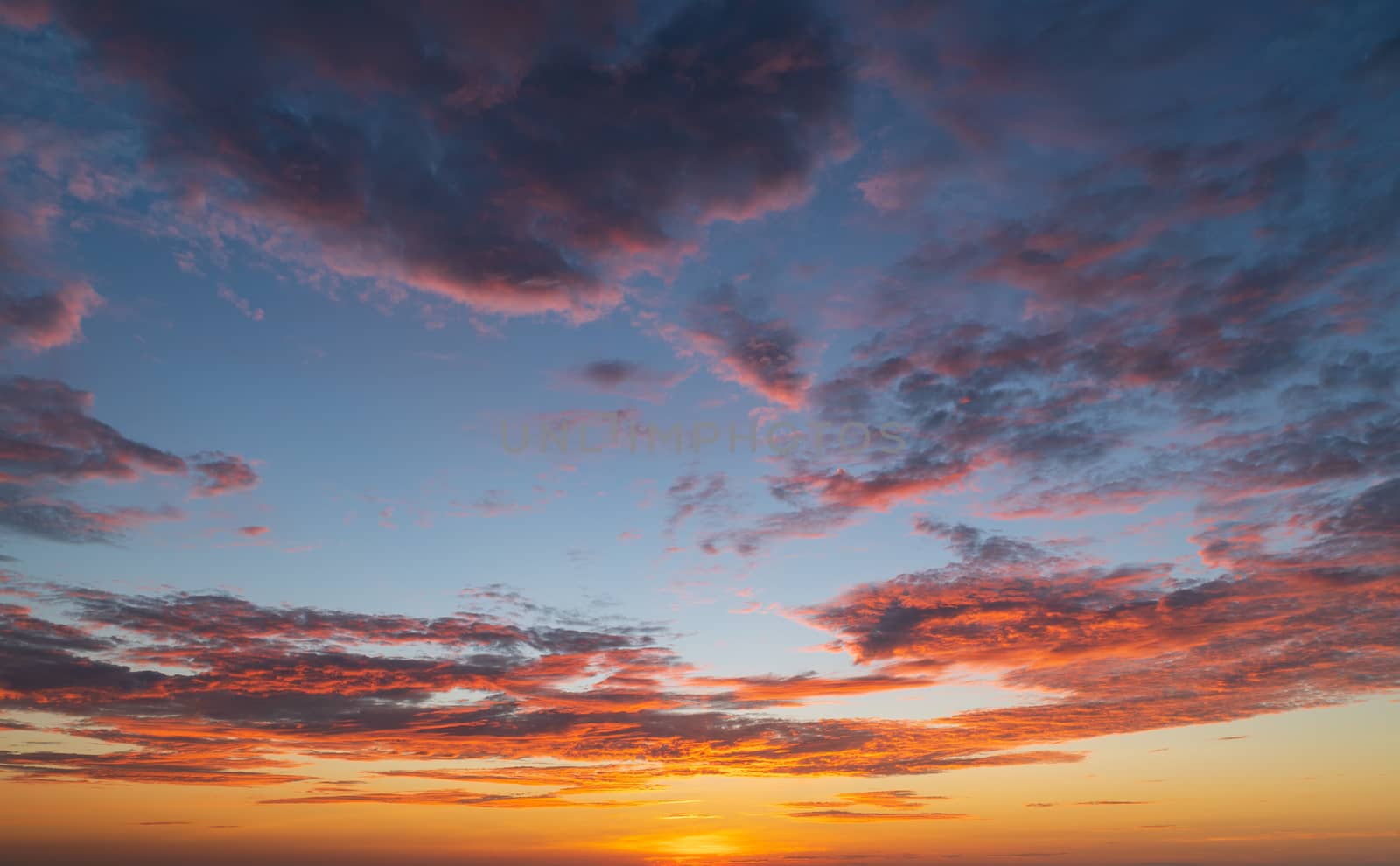 Abstract amazing Scene of stuning Colorful sunset with clouds ba by Boophuket