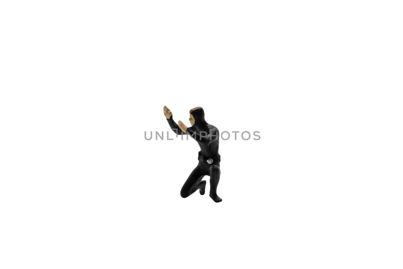 Miniature people : Scuba diver isolated on white background with clipping path