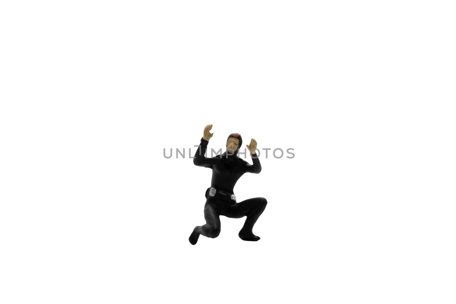 Miniature people : Scuba diver isolated on white background with clipping path