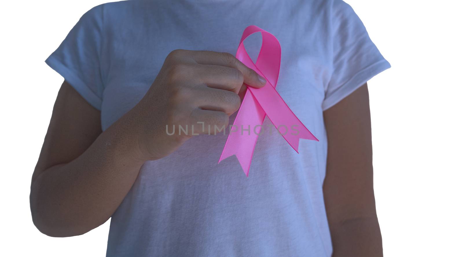 A woman with a pink ribbon on breast cancer awareness Concept of health care and medicine.