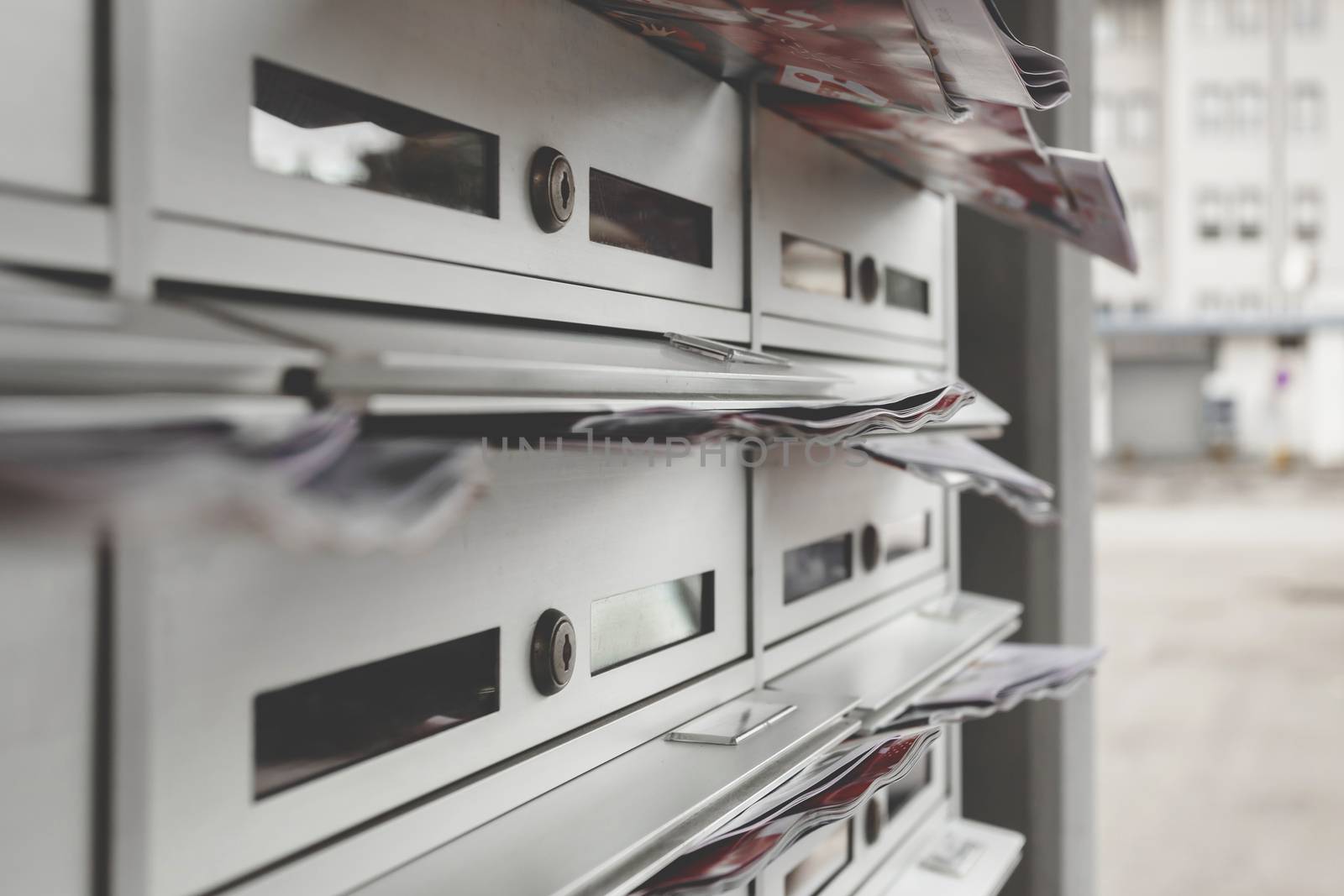 Letter boxes of condominiums in the city. Shallow depth of field.