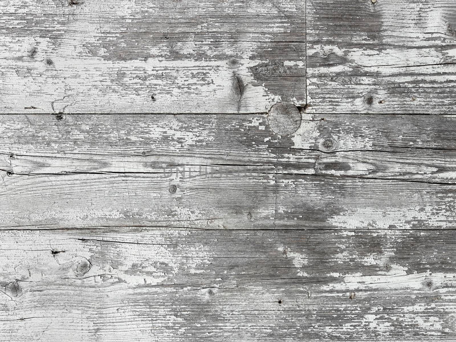 White vintage wooden planks. Old grunge wood with peeling paint. Horizontal planks.