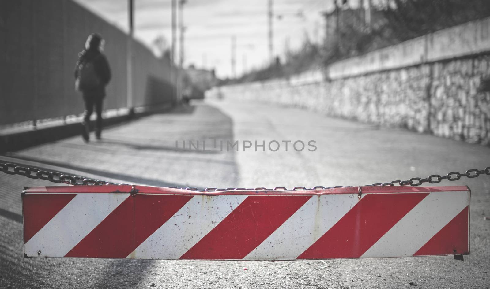 Boy going back to school after covid-19 quarantine. Kid with backpack goes back to school. Retro style photo.