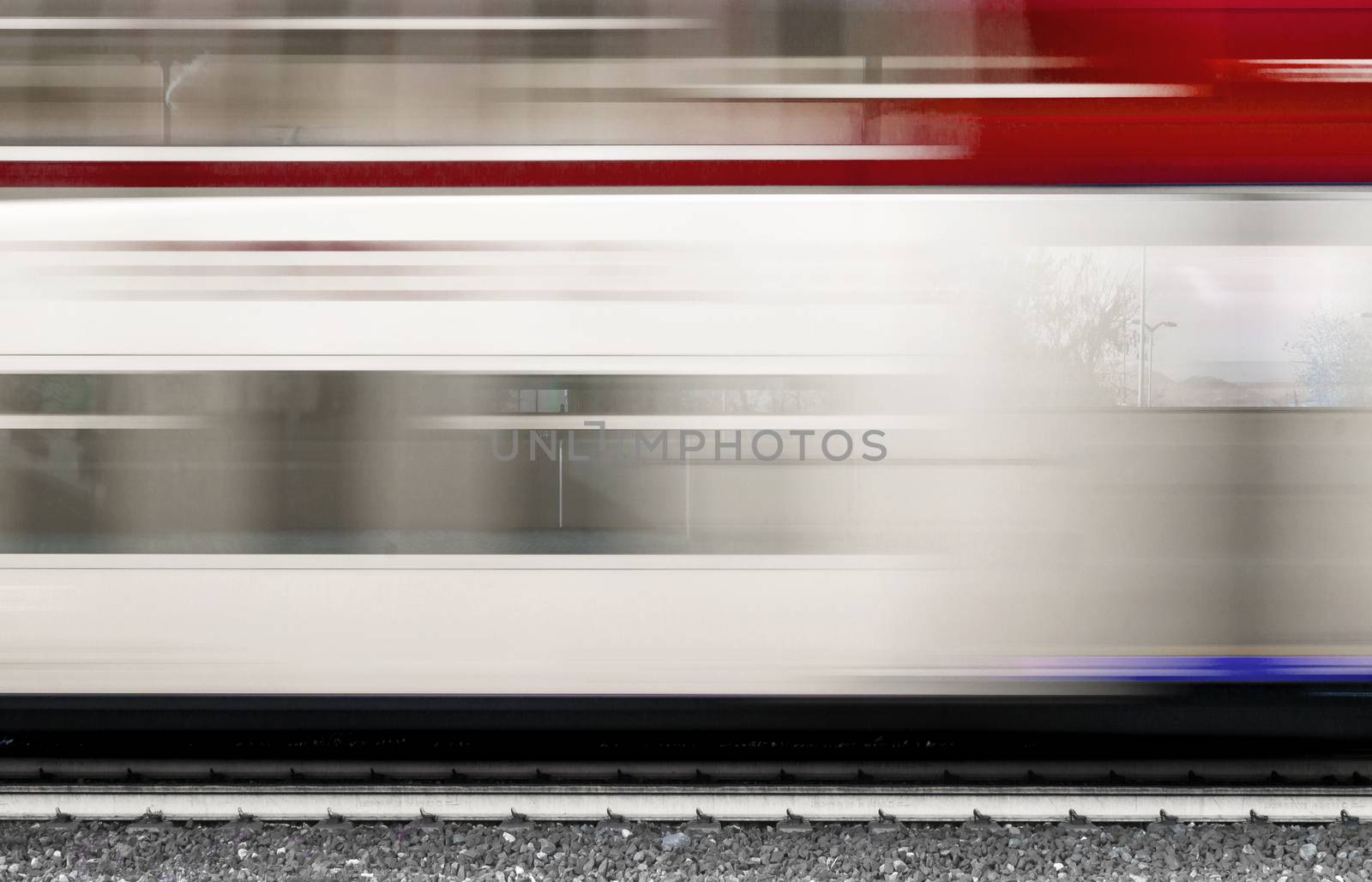 Modern high speed train with motion blur. Abstract composition of moving train with motion blur.