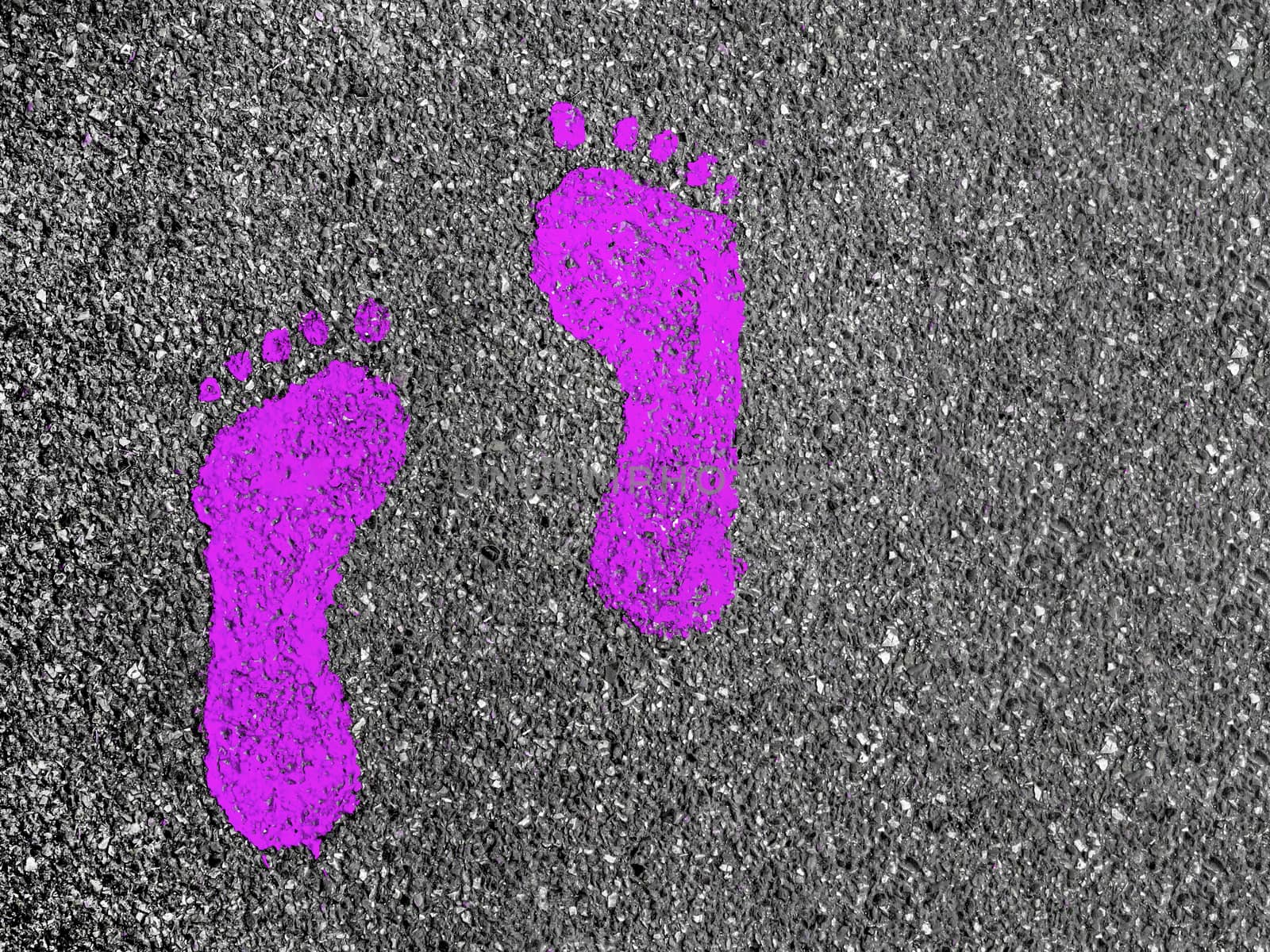 Violet footprint signs on an asphalt road for pedestrian. Symbol of walkway.