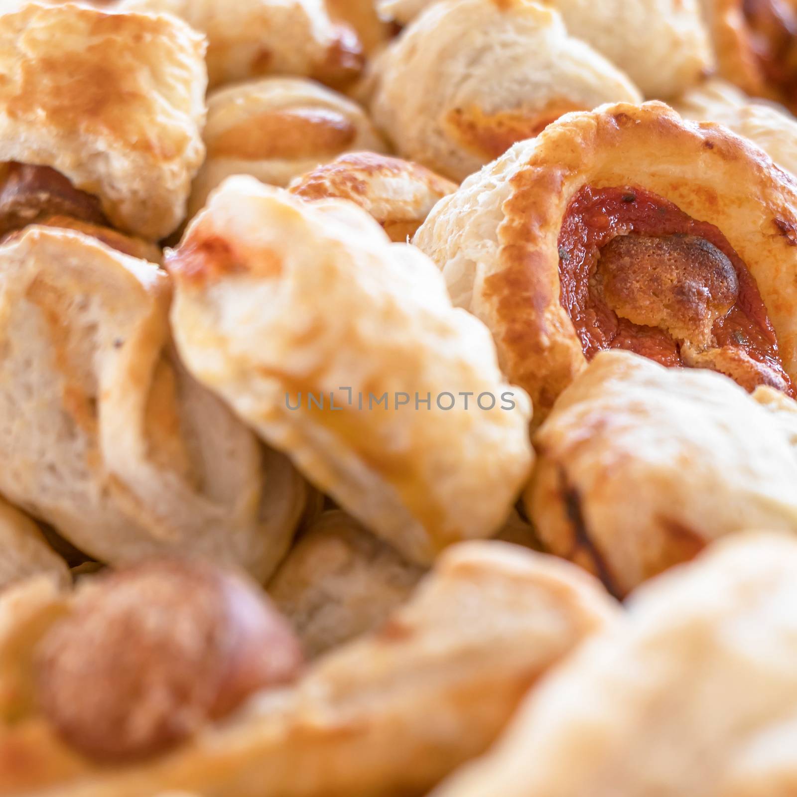 Vol-au-vents puff pastry with meat and tomato. Close-up. Shallow DOF.