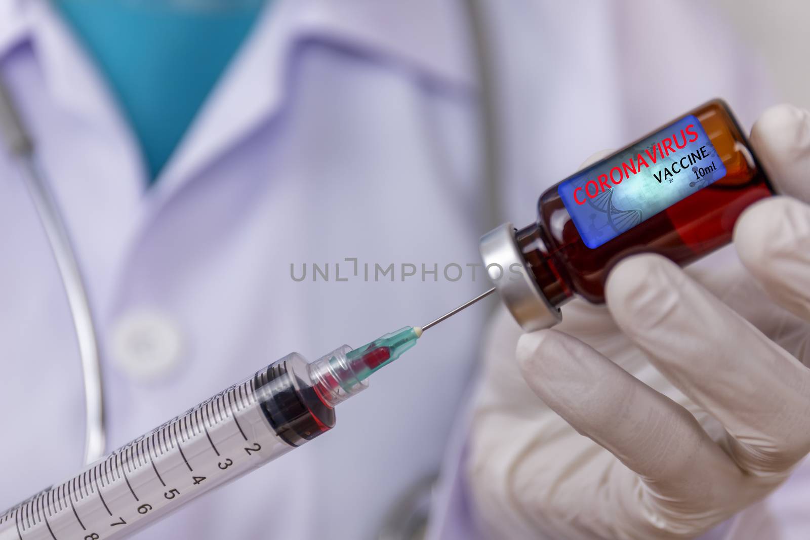 Covid-19, Coronavirus vaccine concept. Doctor, nurse, scientist, researcher hand in latex gloves holding vaccine in glass vial, Hands of doctor holding syringe and take vaccine from glass vial.