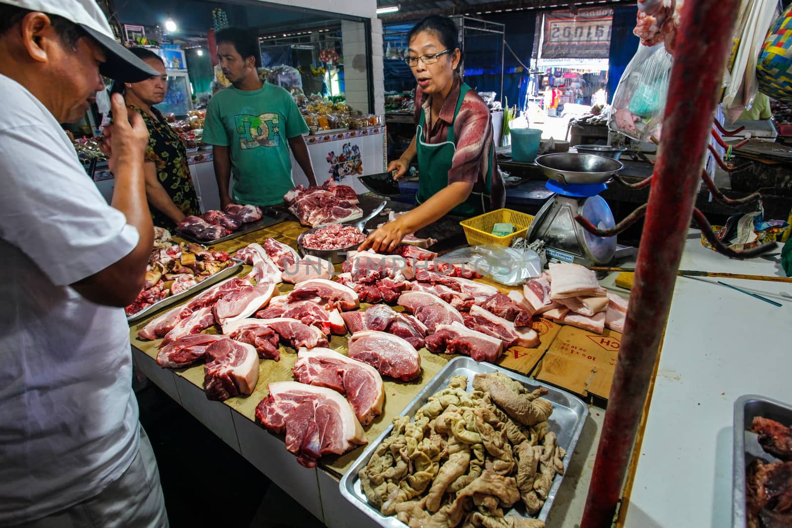 Khao Lak, Thailand - February 22, 2016:  Unknown man buying fres by Ivanko