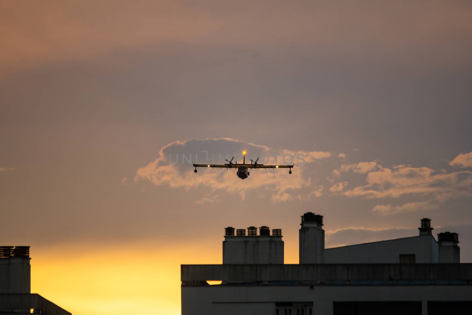 Amphibious water bomber in flight by dutourdumonde