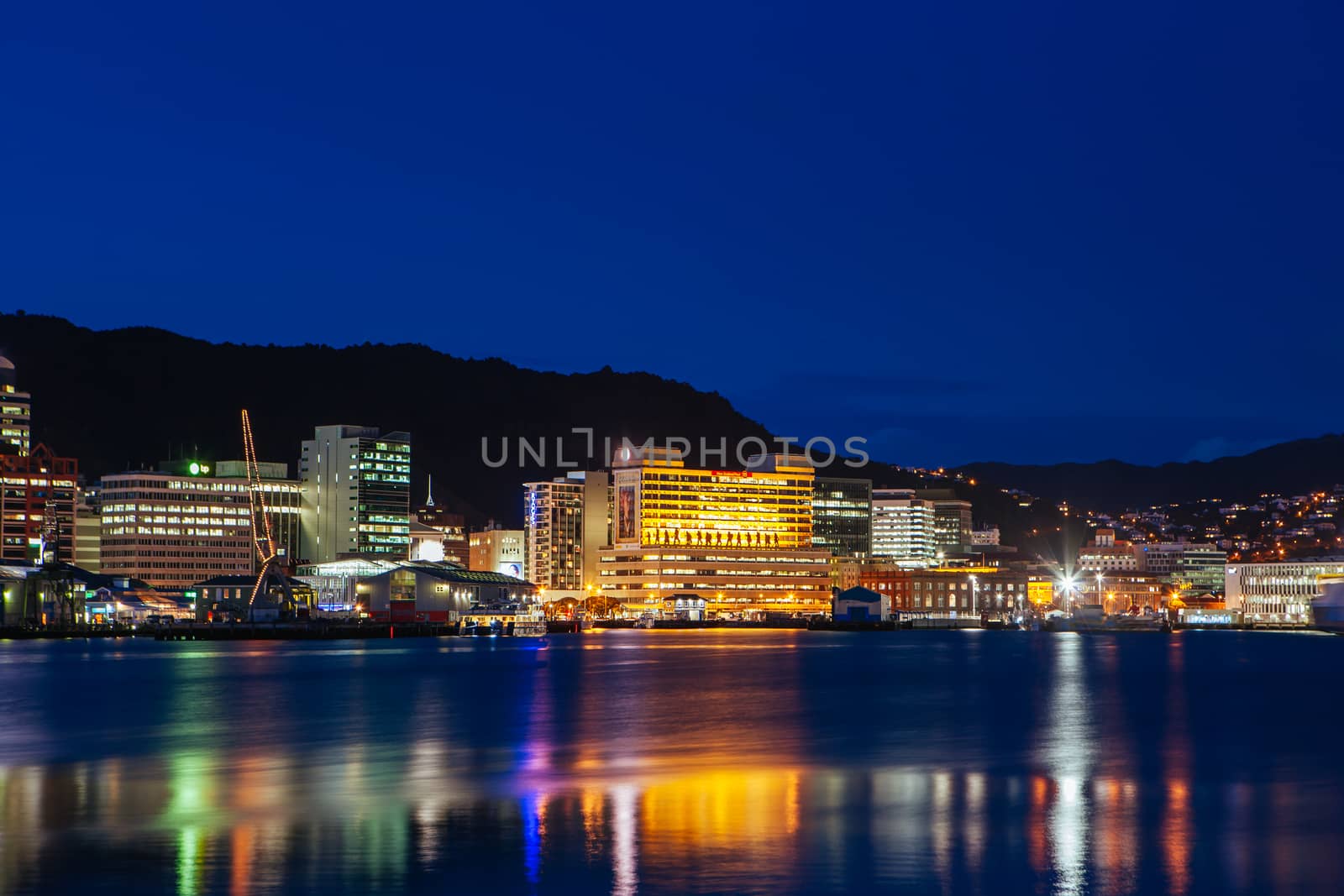 View over Wellington skyline and harbour at dusk in Wellington, New Zealand