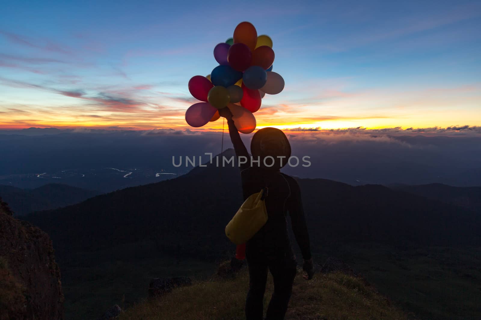 man with a balloon Along with the evening view Doi Mon Chong area, Chiang Mai.