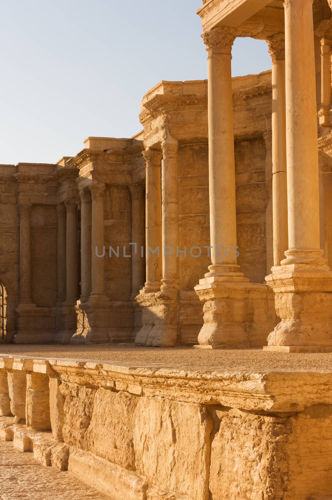 Palmyre Syria 2009 This ancient site has many Roman ruins, these standing columns shot in late afternoon sun with the citadel on the hill in the background . High quality photo