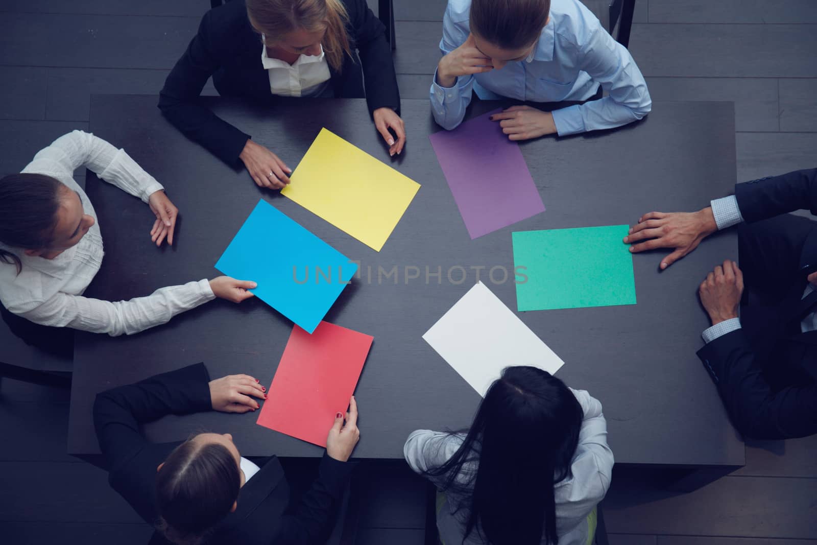 Group of business people with blank colorful paper, new project concept