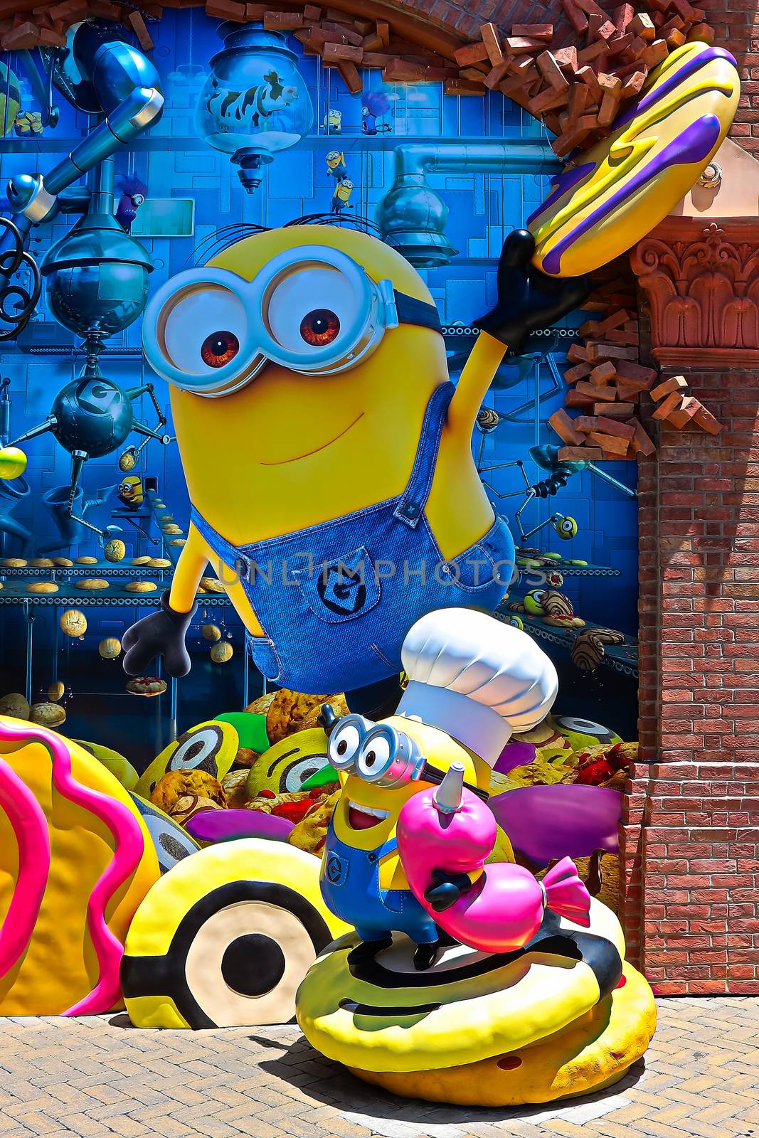 OSAKA, JAPAN - June 17, 2020 : Statue of HAPPY MINION easter version in Universal Studios Japan.Minions are famous character from Despicable Me animation.Universal Studios Japan reopening after COVID-19 quarantine.