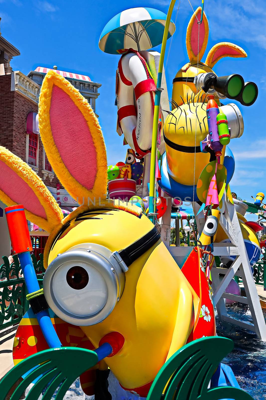 OSAKA, JAPAN - June 17, 2020 : Statue of HAPPY MINION easter version in Universal Studios Japan.Minions are famous character from Despicable Me animation.Universal Studios Japan reopening after COVID-19 quarantine.