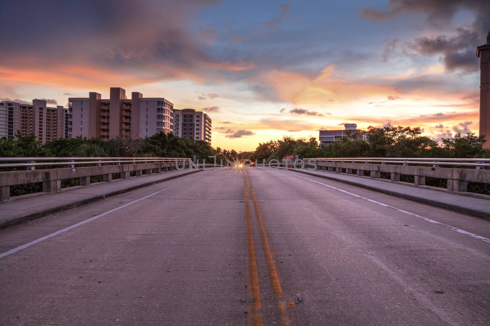 Middle of the road Overpass on Bluebill Avenue leading toward De by steffstarr