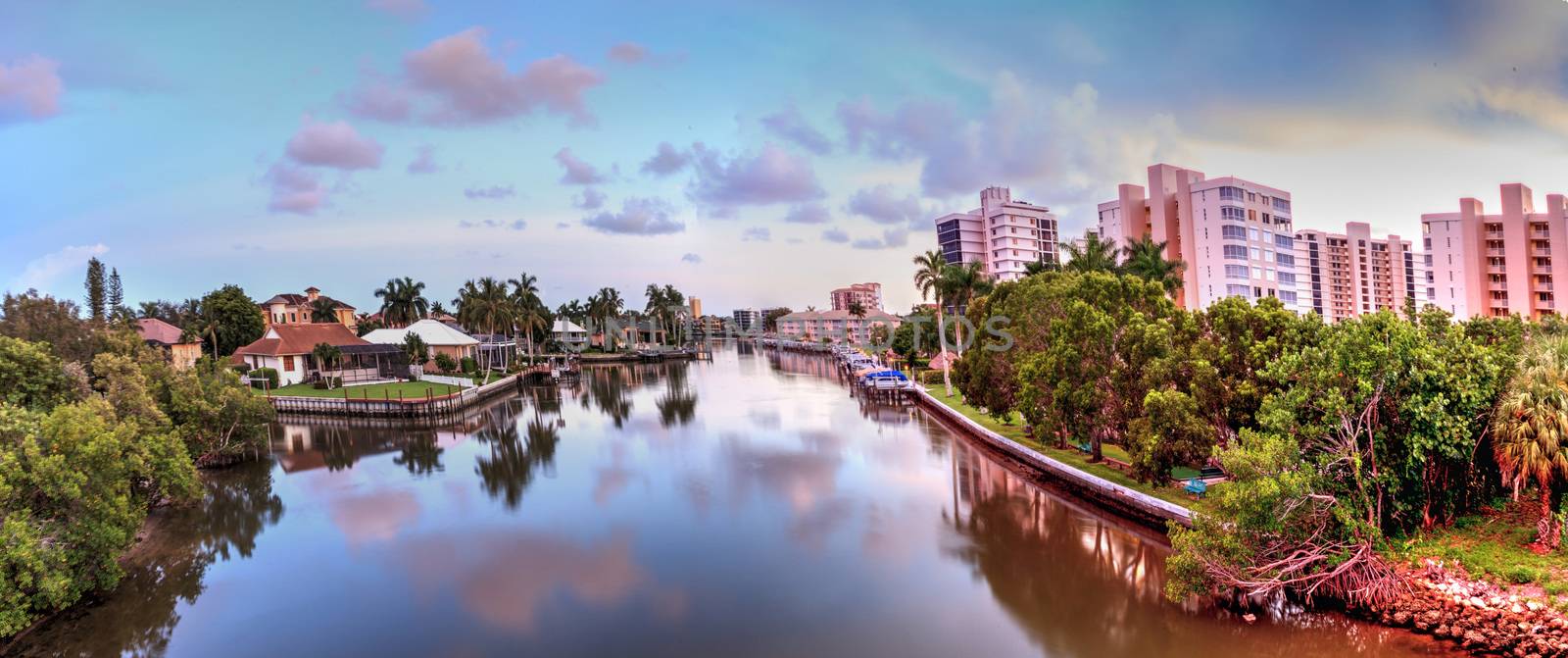 Calm water at sunset over Wiggins Pass on the riverway out to Delnor Wiggins State Park in Naples, Florida.